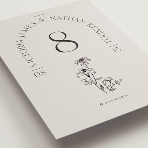 This is a linen table numbers with foil pressed by Baumbirdy called floral type arch printing on doublethick in standard