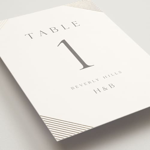 This is a slate table numbers with foil pressed by Vanessa Doyle called song of solomon printing on doublethick in standard