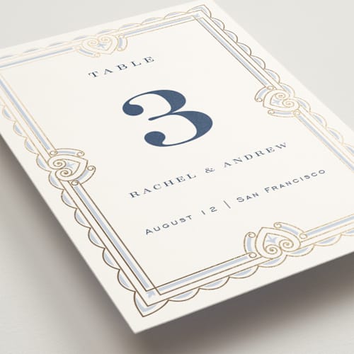 This is a dusty blue table numbers with foil pressed by Janean Hinger called aurelia printing on doublethick in standard