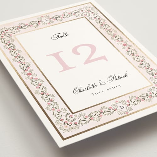 This is a peony table numbers with foil pressed by Susan Moyal called embrace printing on doublethick in standard