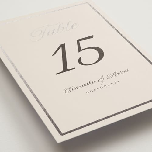 This is a antique table numbers with foil pressed by Nicole Walsh called tux printing on doublethick in standard