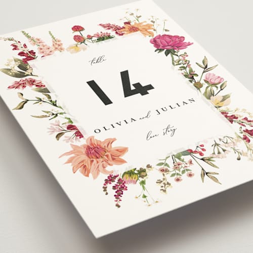 This is a magenta table numbers with foil pressed by Susan Moyal called lush printing on doublethick in standard