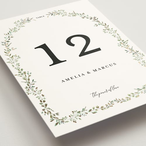 This is a mojito table numbers with foil pressed by Susan Moyal called monogramed arch printing on doublethick in standard