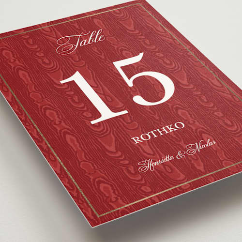 This is a crimson table numbers with foil pressed by Studio Suku called moiré printing on doublethick in standard