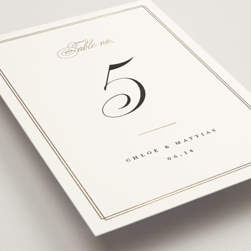 This is a linen table numbers with foil pressed by Erica Krystek called timeless printing on doublethick in standard