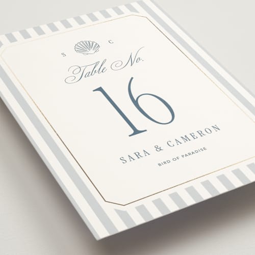 This is a coast table numbers with foil pressed by Kelly Schmidt called seashore printing on doublethick in standard