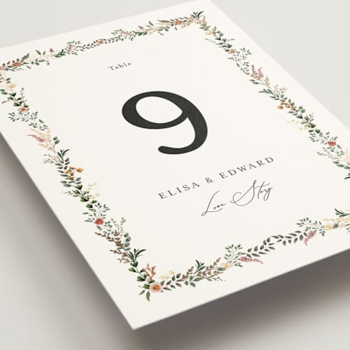 This is a blush table numbers with foil pressed by Susan Moyal called blooming vine printing on doublethick in standard