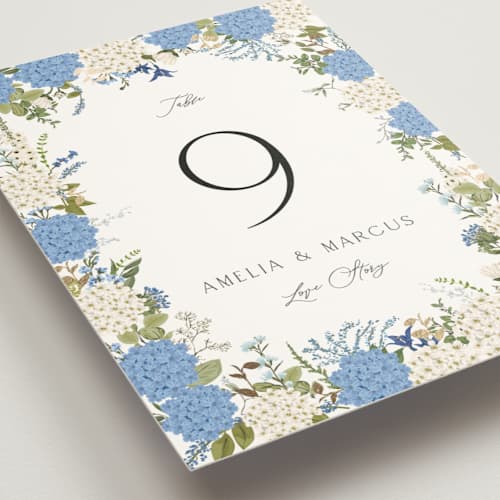 This is a coastal table numbers with foil pressed by Susan Moyal called garden whisper printing on doublethick in standard