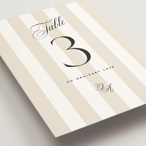 This is a almond table numbers with standard by Eric Clegg called modern romance printing on doublethick in standard