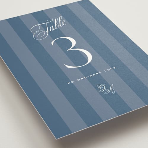 This is a cerulean table numbers with standard by Eric Clegg called modern romance printing on doublethick in standard