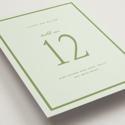 This is a forest table numbers with standard by Sara Hicks Malone called dewberry printing on doublethick in standard