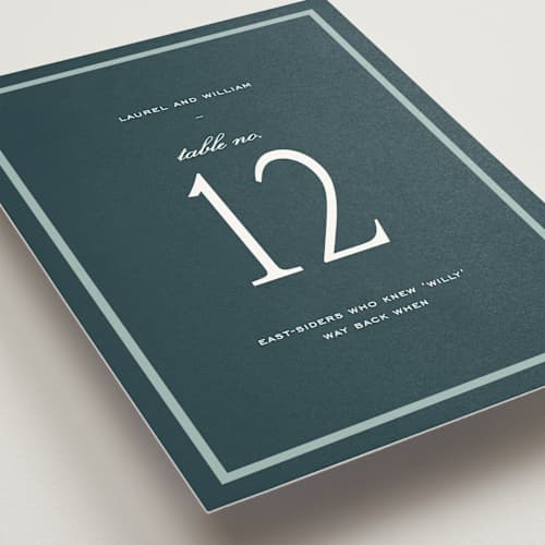 This is a teal table numbers with standard by Sara Hicks Malone called dewberry printing on doublethick in standard