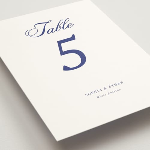This is a midnight navy table numbers with standard by Cass Loh called chic union printing on doublethick in standard