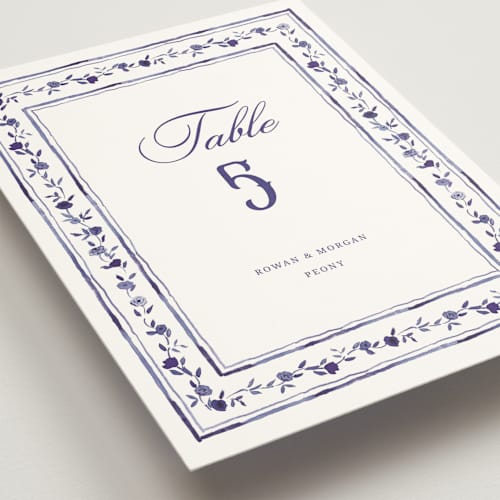 This is a plum table numbers with standard by Cass Loh called blooming crest printing on doublethick in standard