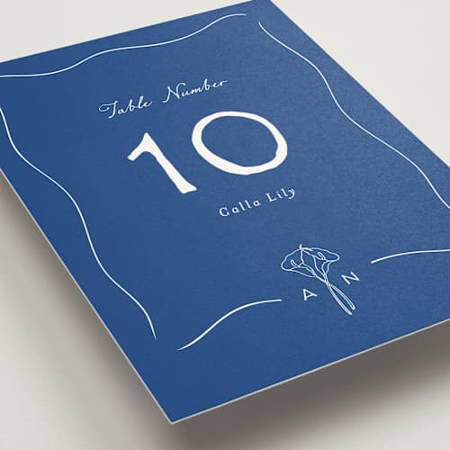 This is a cobalt table numbers with standard by Leah Bisch called pair of calla lilies printing on doublethick in standard