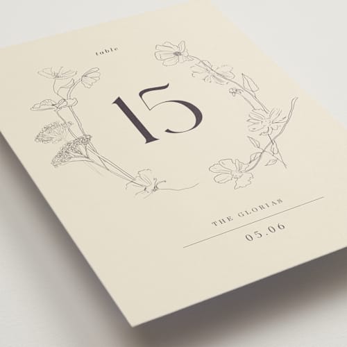 This is a ivory table numbers with standard by Baumbirdy called floral stamp printing on doublethick in standard