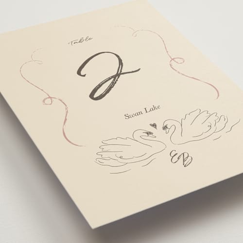 This is a buttercream table numbers with standard by Helena Vitto called the swan printing on doublethick in standard