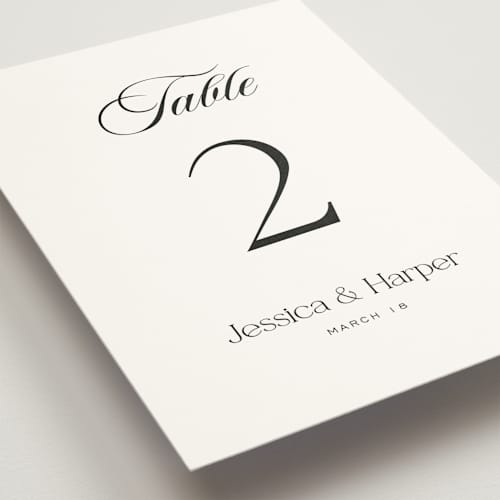 This is a obsidian table numbers with standard by Jennifer Postorino called modern romance printing on doublethick in standard