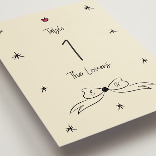 This is a champagne table numbers with standard by Helena Vitto called modern love printing on doublethick in standard