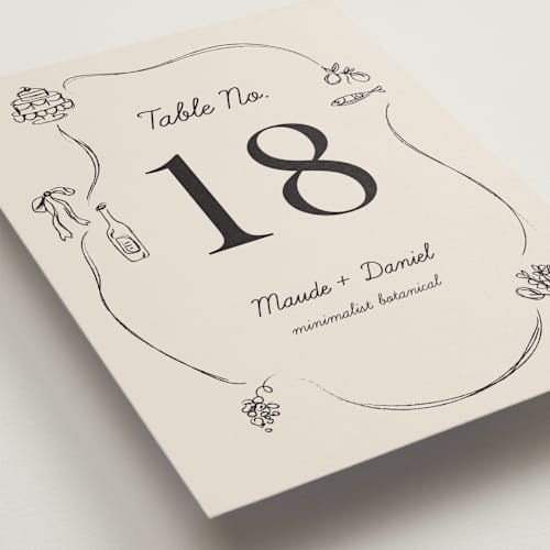 This is a ivory table numbers with standard by Aviva Atri called sketchbook love printing on doublethick in standard