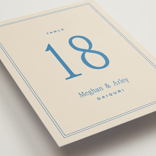 This is a cornflower table numbers with standard by Ellen Schlegelmilch called cherry printing on doublethick in standard