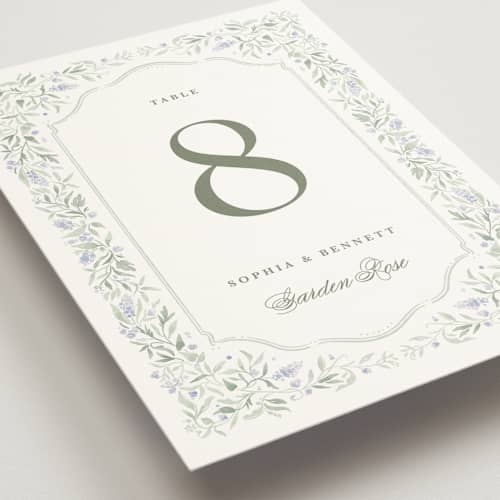 This is a periwinkle table numbers with standard by Kristen Smith called delicate vines printing on doublethick in standard