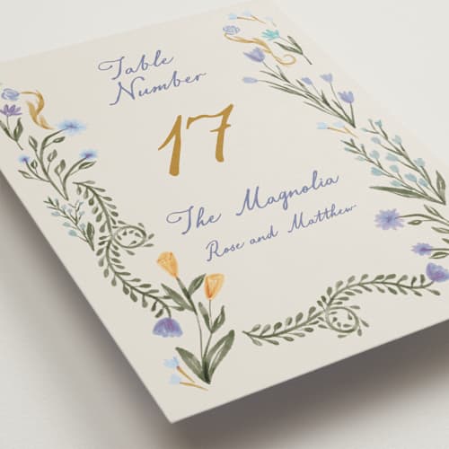 This is a cornflower table numbers with standard by Maja Cunningham called chantilly printing on doublethick in standard