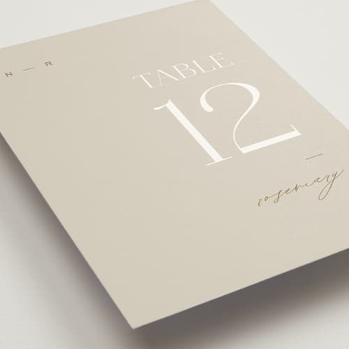 This is a natural table numbers with standard by Leah Bisch called oval printing on doublethick in standard