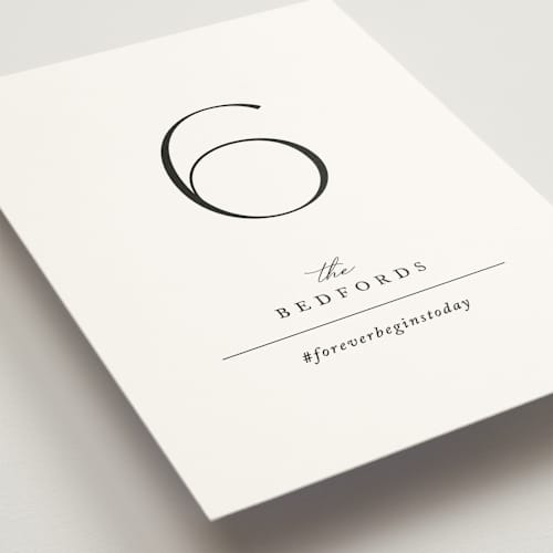 This is a pearl table numbers with standard by Jennifer Postorino called initial printing on signature in standard