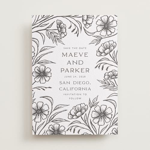 This is a soft black save the date with letterpress by Katharine Watson called inked wildflowers printing on white cotton in standard