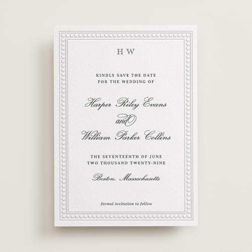 This is a soft black save the date with letterpress by Jenna Holcomb called the ritz printing on white cotton in standard