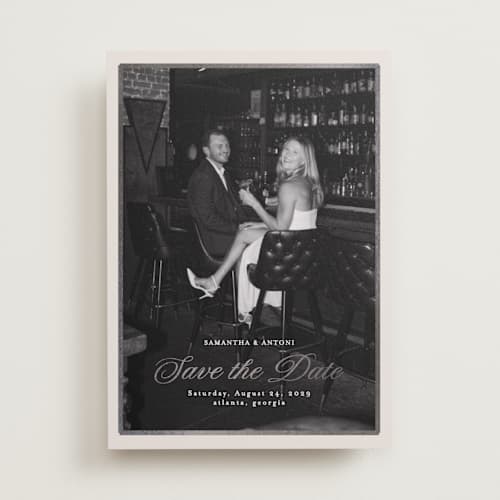 This is a antique foil stamped save the date cards with foil pressed by Nicole Walsh called tux printing on recycled smooth signature in standard