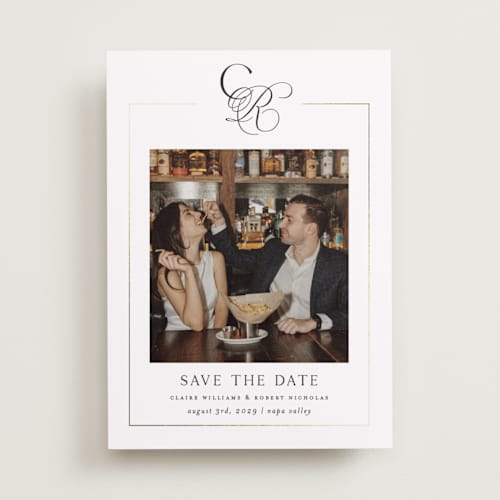 This is a silk foil stamped save the date cards with foil pressed by Kelly Schmidt called monogram script printing on recycled smooth signature in standard