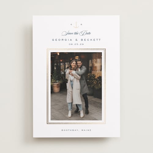 This is a royal navy foil stamped save the date cards with foil pressed by Olivia Raufman called anchored printing on recycled smooth signature in standard