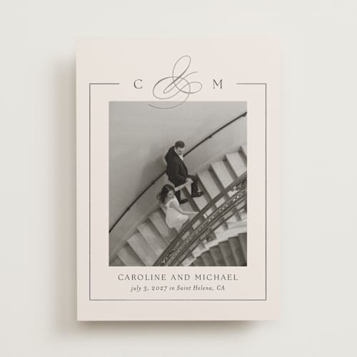 This is a linen foil stamped save the date cards with foil pressed by Kelly Schmidt called framed monogram printing on recycled smooth signature in standard