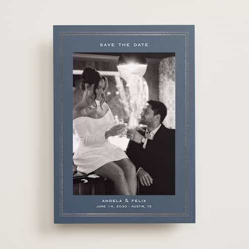 This is a steel foil stamped save the date cards with foil pressed by Nicole Walsh called double frame printing on recycled smooth signature in standard