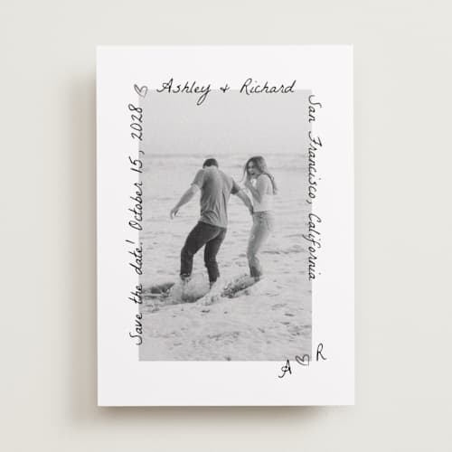This is a graphite foil stamped save the date cards with foil pressed by Claudia Orengo called showered printing on recycled smooth signature in standard