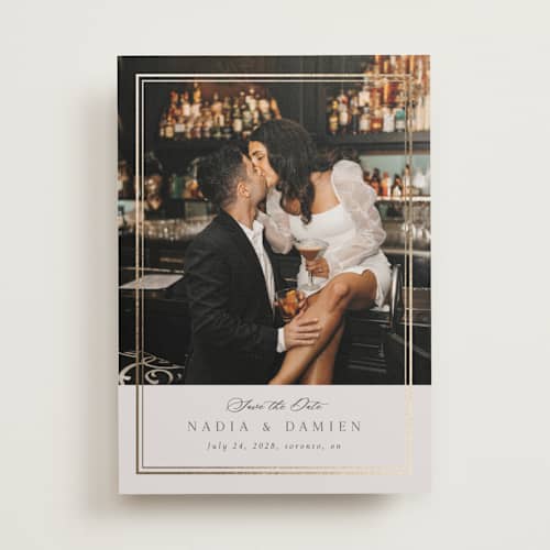 This is a linen foil stamped save the date cards with foil pressed by Nicole Walsh called shimmer printing on recycled smooth signature in standard