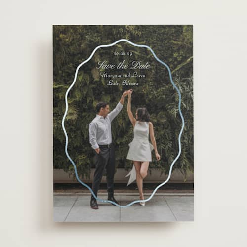 This is a periwinkle foil stamped save the date cards with foil pressed by Baumbirdy called scallop frame printing on recycled smooth signature in standard