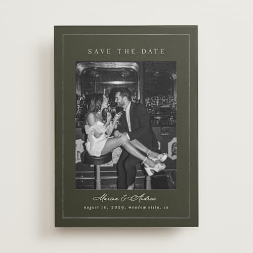 This is a olive foil stamped save the date cards with foil pressed by Nicole Walsh called refined printing on recycled smooth signature in standard