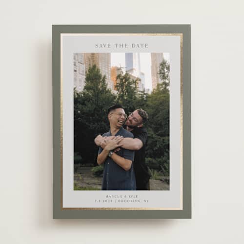 This is a sage foil stamped save the date cards with foil pressed by Nicole Walsh called foil frame printing on recycled smooth signature in standard