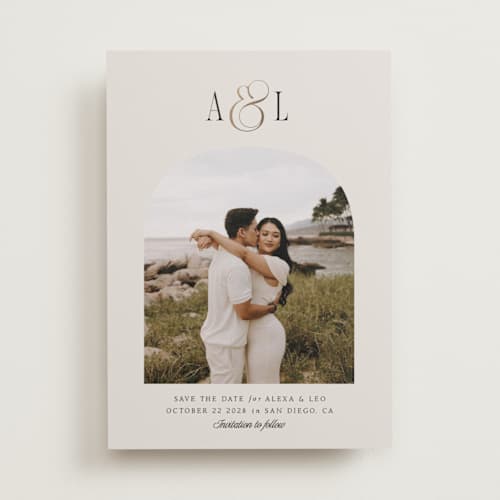 This is a cream foil stamped save the date cards with foil pressed by Robert and Stella called skye printing on recycled smooth signature in standard