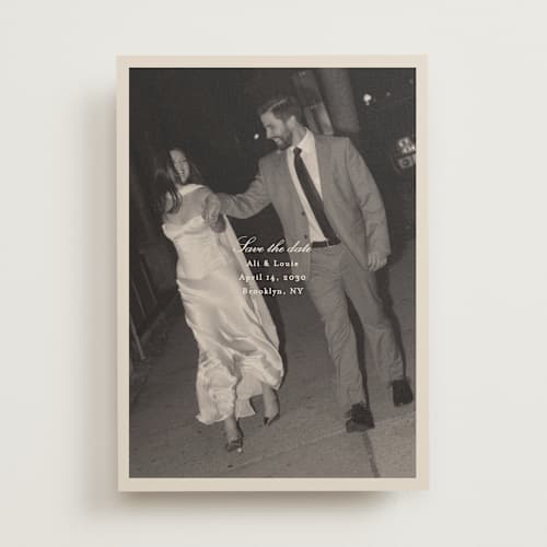 This is a cream save the date with standard by Ellen Schlegelmilch called louie printing on recycled smooth signature in standard