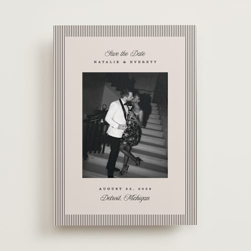 This is a noir save the date with standard by Pixel and Hank called linea printing on recycled smooth signature in standard