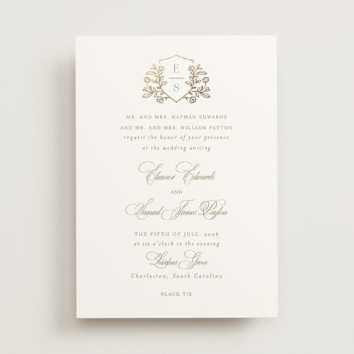 This is a ivory foil stamped wedding invitations with foil pressed by Mansi Verma called gold crest printing on signature in standard