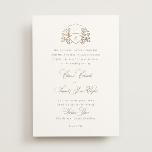 This is a ivory foil stamped wedding invitations with foil pressed by Mansi Verma called gold crest printing on signature in standard