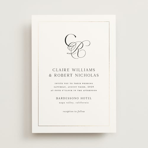 This is a silk foil stamped wedding invitations with foil pressed by Kelly Schmidt called monogram script printing on signature in standard