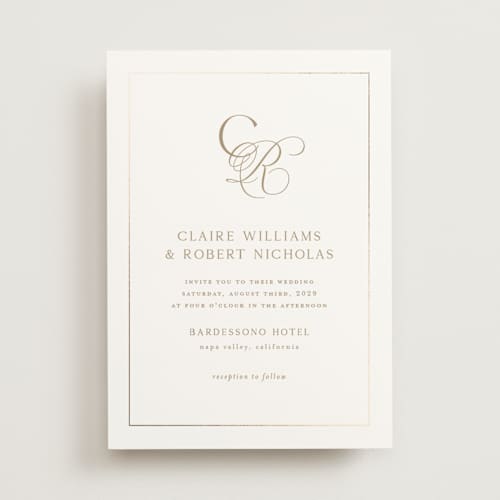 This is a golden foil stamped wedding invitations with foil pressed by Kelly Schmidt called monogram script printing on signature in standard