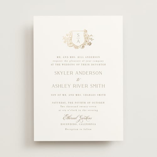 This is a champagne foil stamped wedding invitations with foil pressed by Cass Loh called floral crest printing on signature in standard