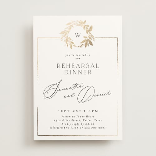 This is a silk rehearsal dinner invitations with foil pressed by Phrosné Barwood called monogram wreath printing on signature in standard